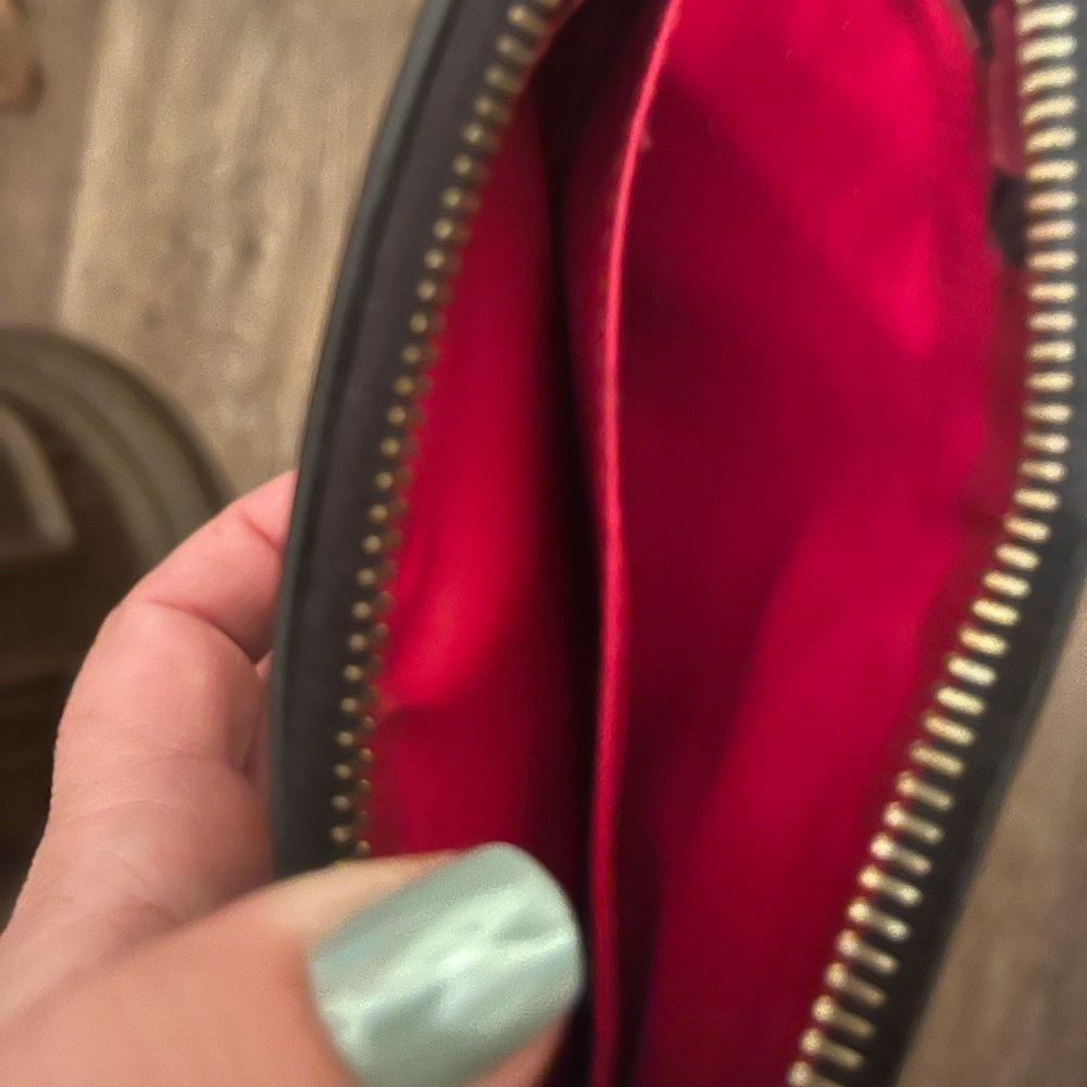 Dooney & Bourke Black Clutch with Red Interior